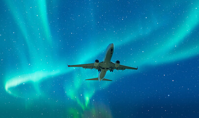 Northern Lights or Aurora Borealis with commercial passenger airplane