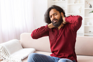 Indian Man Suffering From Neck Pain Massaging Aching Muscles