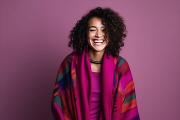 Portrait of a beautiful young african american woman with curly hair and colorful scarf