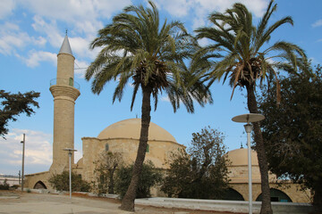 Fototapeta na wymiar Hala Sultan Tekke a mosque built in 1816 on the salt lake of the same name at Larnaca on Cyprus 