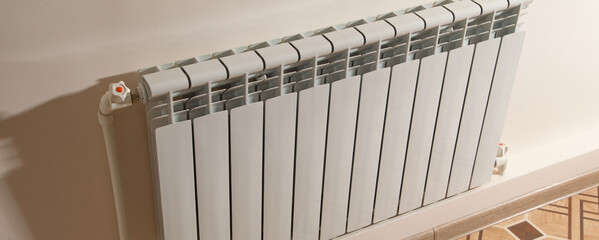Heating radiator on the wall.