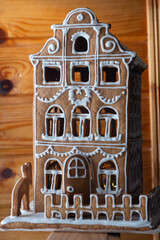 The hand-made eatable Christmas gingerbread house from ginger cookies.