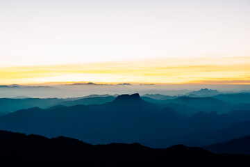 Sunset silhouette of mountain layers