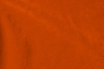 light orange velvet fabric texture used as background. silk color saffron fabric background of soft...