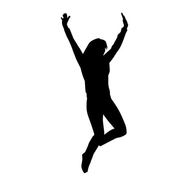 Silhouette of a female dancer in action pose. Silhouette of a woman dancing happily.