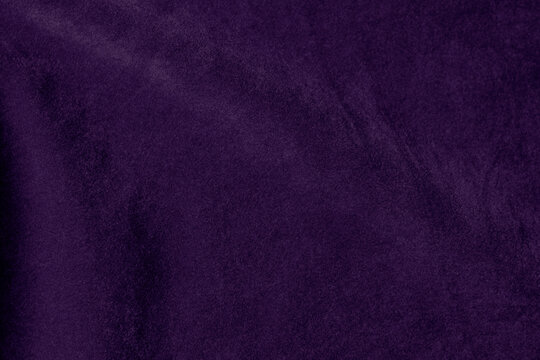 Silk soft purple velvet fabric texture used as background. lavender color fabric background of soft and smooth textile material. crushed velvet .luxury violet soft tone for silk..