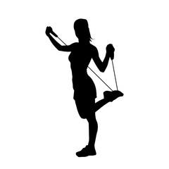 Silhouette of a sporty woman at gym workout using pull rope. Fitness exercise cords pull rope stretch resistance training.