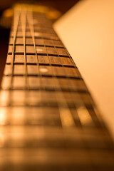 Vertical background with guitar neck with strings
