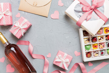 top view photo of st valentine day decor shopping, bag, wine, bottle, envelope, gift, box, candy...