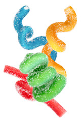 Levitation of colored jelly candy strips in sugar sprinkles isolated on transparent background.