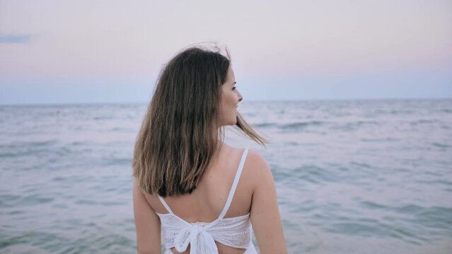 Beautiful Girl Looking At Sunset On The Beach, Slow Motion, 4k