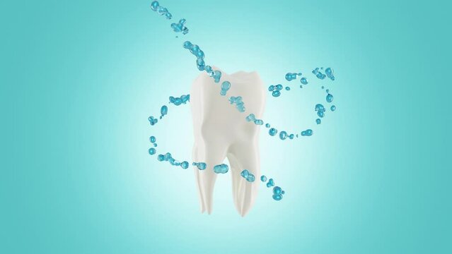 A stream of water swirls around a stained tooth and then the tooth becomes whiter. Blue abstract background. Concept dental hygiene practices, dental prosthetics, oral care