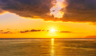Fototapeta na wymiar scenic landscape of colorful sunset or sunrise above water, evening or morning seascape