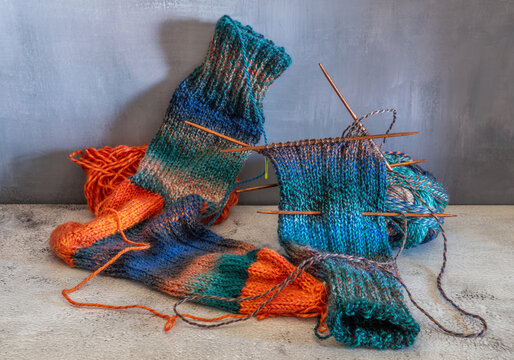 Knitting Socks. Unfinished Work. Beautiful Wool.