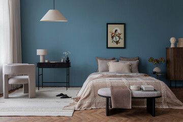 Interior design of cozy living room with mock up poster frame, bed, beige bedding, wooden...
