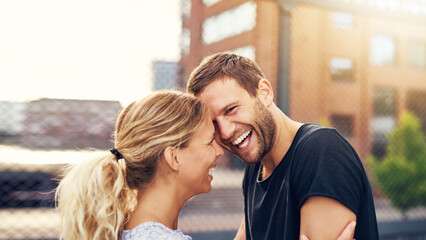 Happy spontaneous couple share a good joke - obrazy, fototapety, plakaty