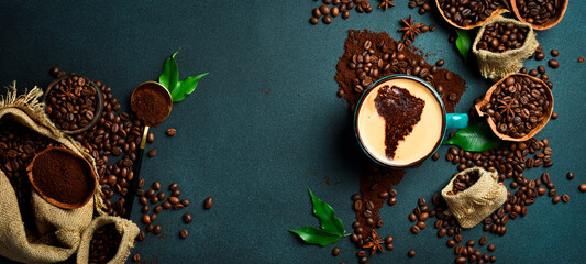 A cup of aromatic fragrant coffee with an image of South America. Set of coffee beans and ground...