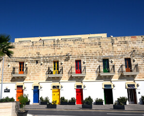 Colored Doors in a  Building in Town of Marsaxlokk, Malta