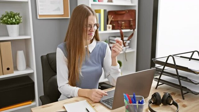 Stinky office drama, young blonde business woman expressing disgust, holding breath against intolerable bad smell, nose telling the tale of unpleasant indoor stench
