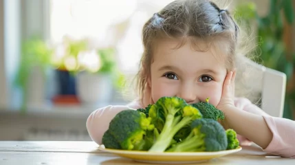 Fotobehang child don't want wo eat broccoli. © ArtCookStudio
