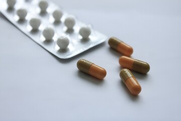 Medical drugs, tablets, capsules on a background