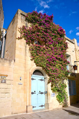 Old wooden blue door in downtown of Mdina, Malta