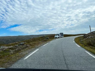 Foto op Plexiglas Motorhome camper in Stegastein view point road, south Norway. Europe © Alberto Gonzalez 