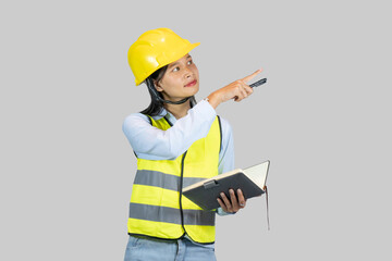 Indian Nepalese Asian Construction Engineer with chartboard and notebook gives expressions, gestures