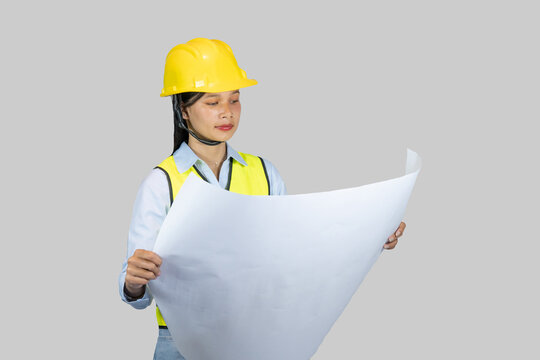 Indian Nepalese Asian Construction Engineer with chartboard and notebook gives expressions, gestures