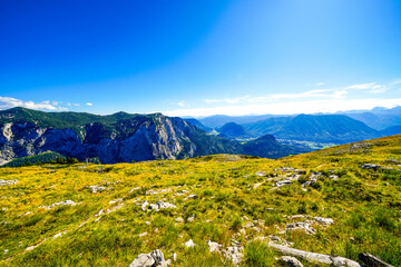 Fototapeta premium View of the surrounding landscape at the Loseralm near Altaussee in the Salzkammergut in Austria. Nature with panoramic views of the mountains on the Loser Alm in Styria. 