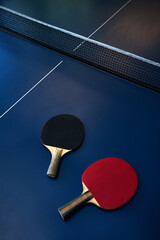Table tennis rackets on table