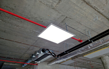 modular ceiling with soffit boards, lights that are connected from a ladder by an electrician...
