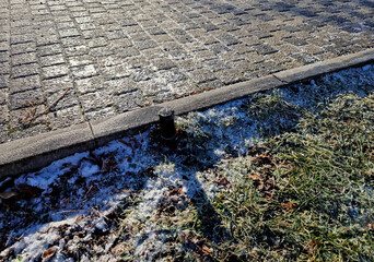 if the irrigation system is started in the winter and ice forms on the sidewalk and lawn in the...