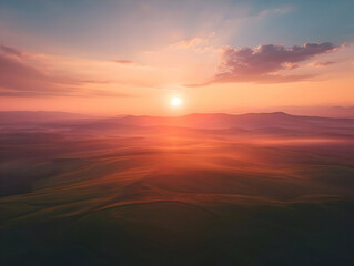 Sunrise over the horizon of the mountains aerial view cinematic photo. High-resolution