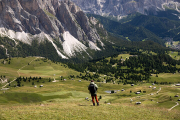 Fototapeta na wymiar Mountain view with climber, Seceda mountain, Dolomites, Italy.