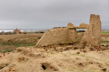 Remains of an old building, bird observatory and lagoons. Sariegos Hill. Villafáfila Lagoons Natural Reserve, Zamora, Spain.