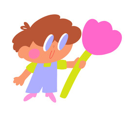 A boy with a pink flower