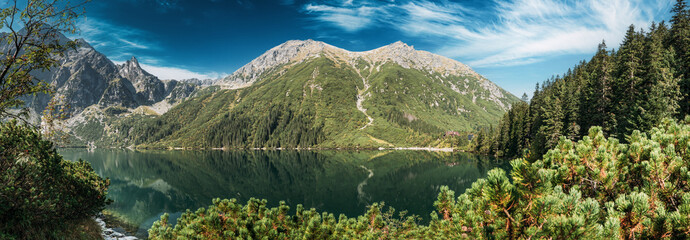 Tatra National Park, Poland. Panorama Famous Mountains Lake Morskie Oko Or Sea Eye Lake In Summer Morning. Five Lakes Valley. Beautiful Scenic View. European Nature. UNESCO's World Network of - obrazy, fototapety, plakaty