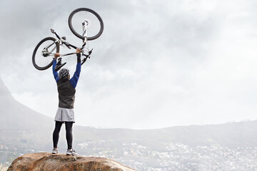Back, celebrate and man with bike on the mountains for training achievement or success. Nature,...