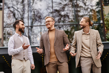 cheerful handsome business leaders with glasses in fashionable attires discussing their startup