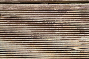 A textured processed wooden surface, a highly detailed close-up of wood grain