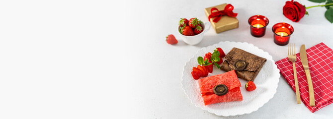 Valentine's day banner on white background. Envelope shaped pancakes with chocolate and fresh strawberries. Cute romantic breakfast. Web line for restaurant, cafe. Copy space. top view