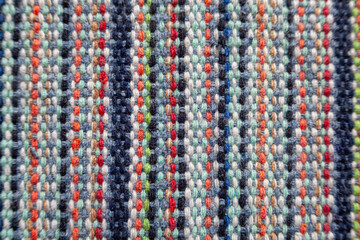 Macro texture of striped colorful wool