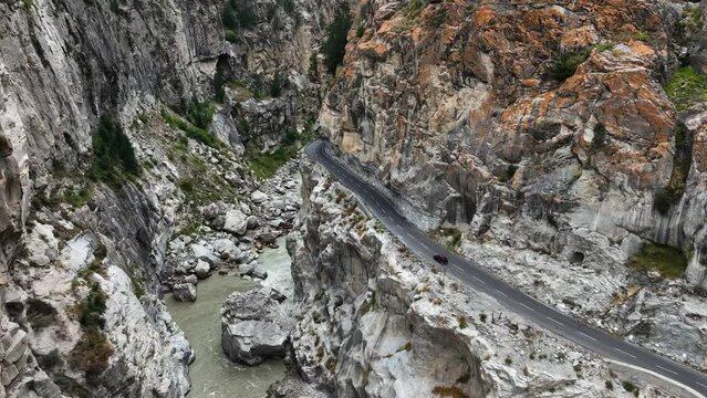 Aerial video of a road through the mountains