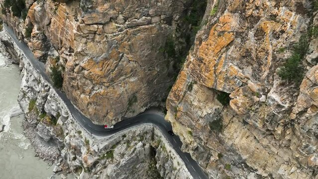 Aerial video of a road through the mountains 