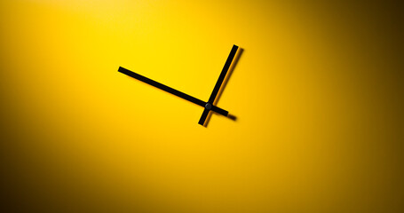 Abstract clock - modern clock hands showing time under dramatic light on a yellow background. - 707864609