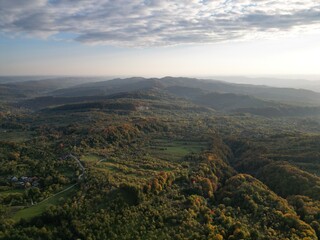 Aerial photo of colorful Carpathian landscape by sunset. Autumn scenery in central Romania. - 707865210