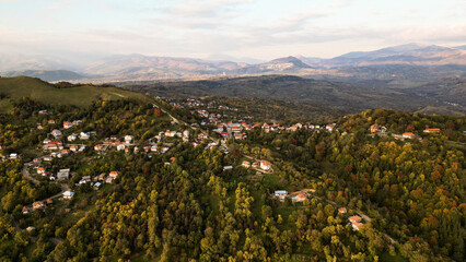 Mountain village in the Carpathians, Romania. Aerial drone shot - 707865269