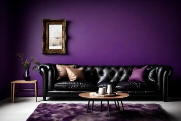 A black leather sofa in front of a deep purple wall, creating a stylish living room.