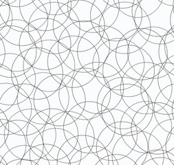 Abstract drawing of black lines in the shape of a circle on a white background.Seamless pattern.